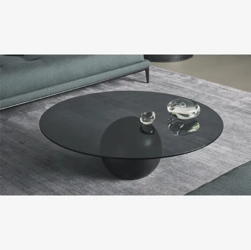 Tavolino rotondo Circus coffee table con top in cristallo fumè sorretto da una base sferica in metallo di Bonaldo
