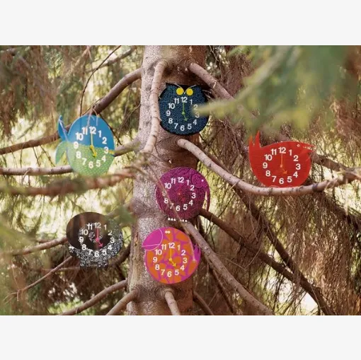 Orologi a forma di animali in legno stampato Zoo Timers di Vitra