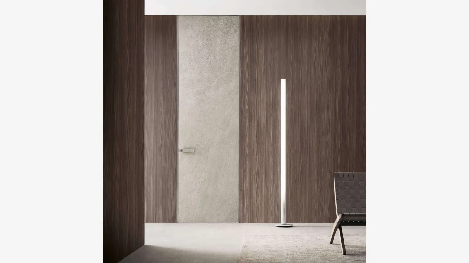 Porta a filo muro per interni Moon in finitura gres crema con struttura in alluminio finitura Platino di Rimadesio