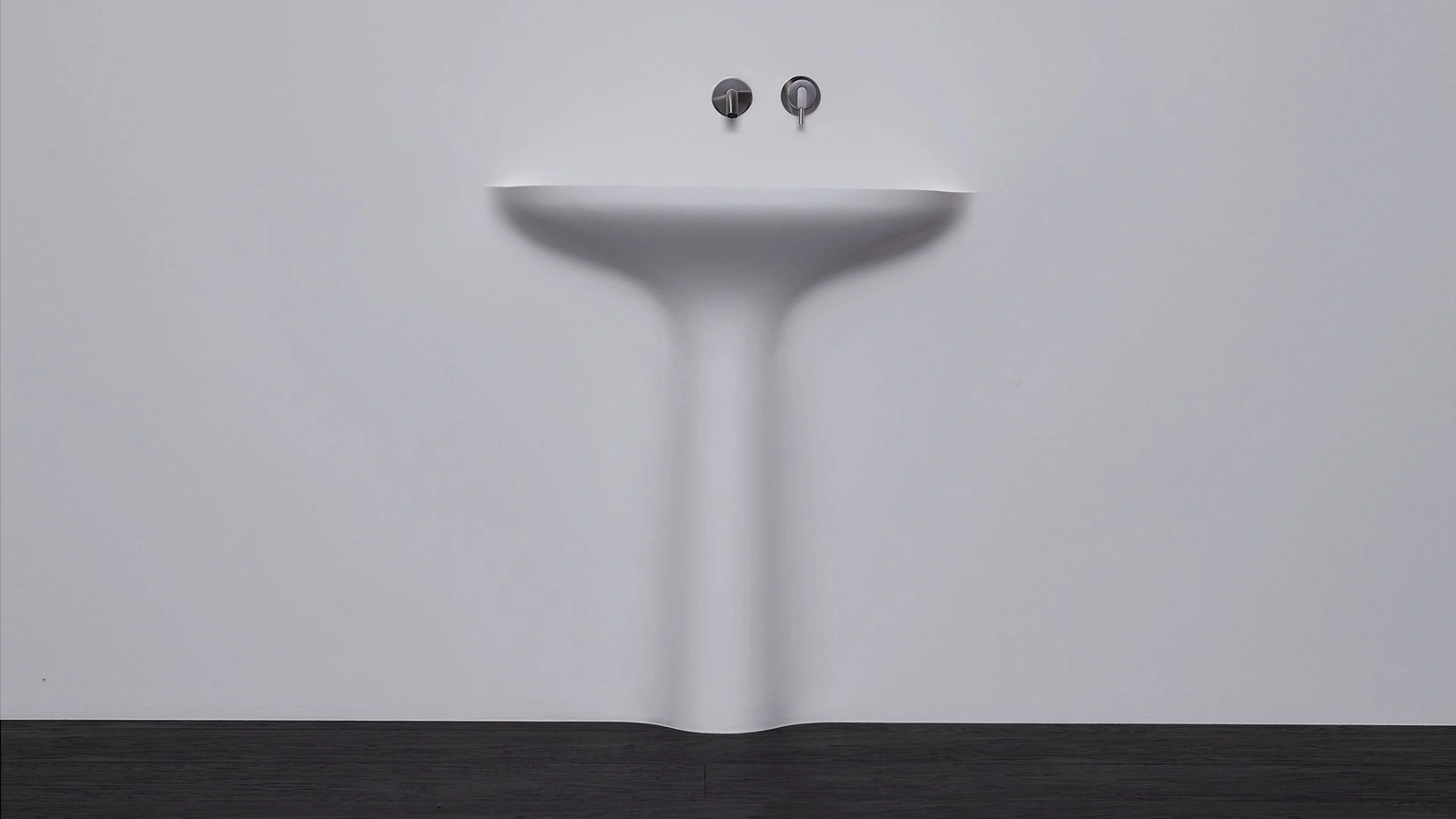 Lavabo in resina Corian incassato nel muro Calice di Antoniolupi