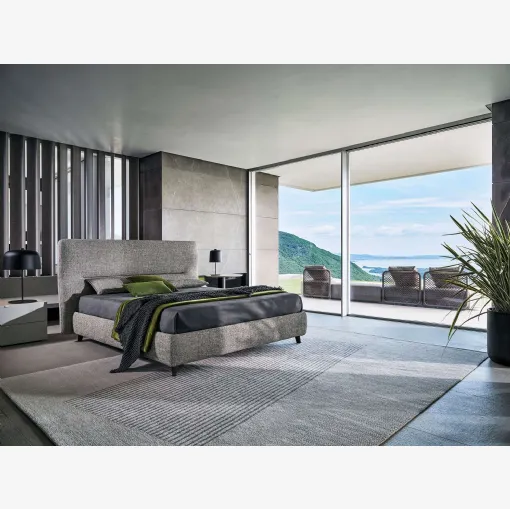 Letto in tessuto con testiera De Light di Twils