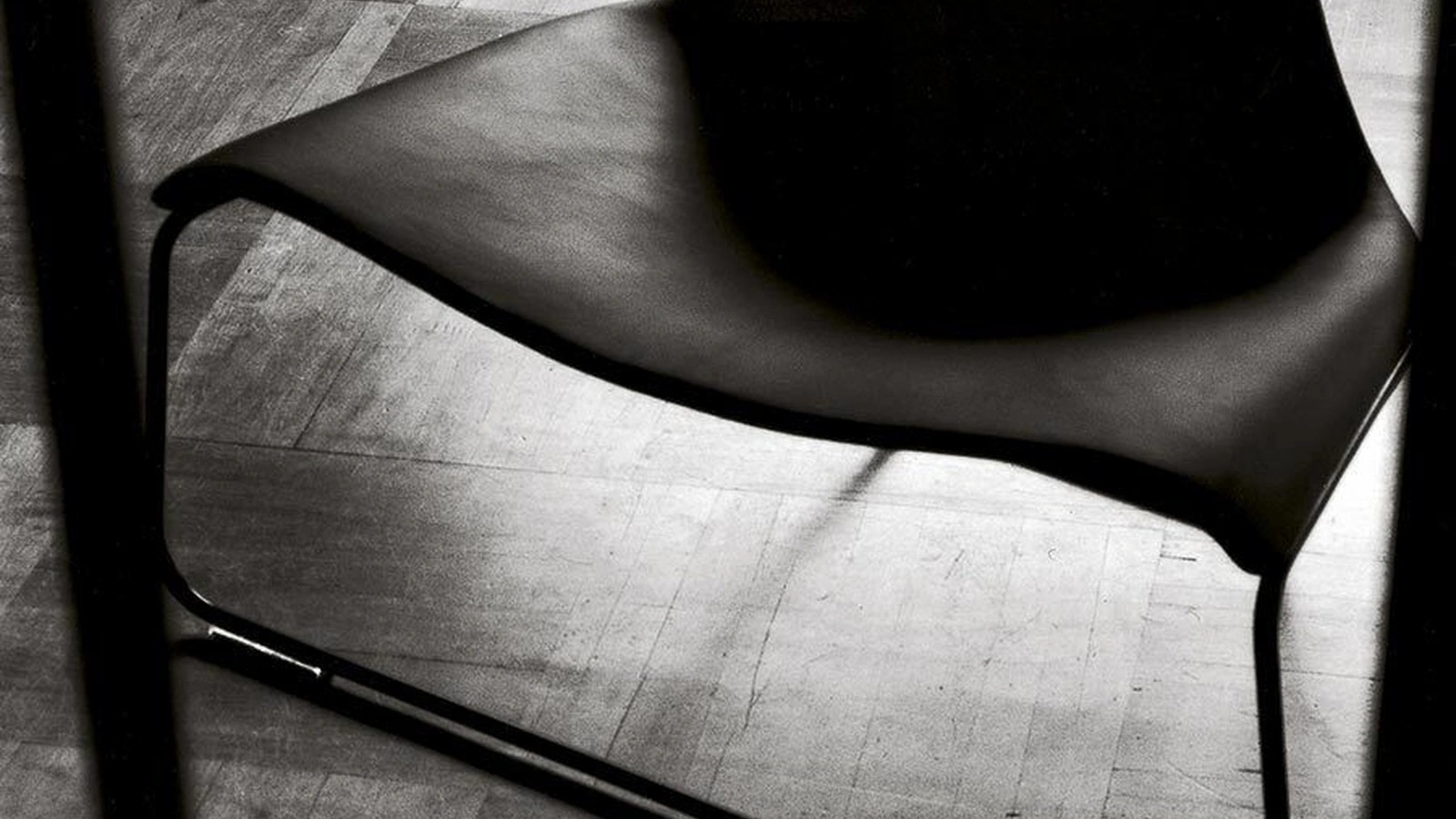 Poltrona di design Glide di Tacchini