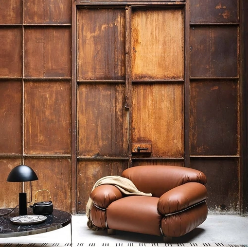 Poltrona in pelle Sesann di Tacchini