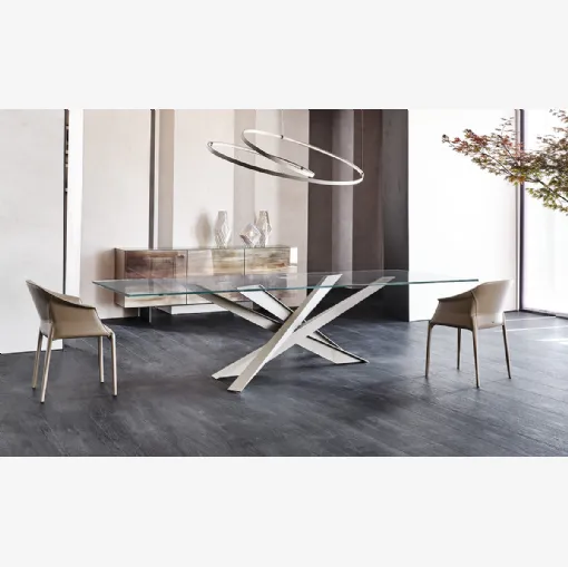 Tavolo dalle linee scultoree con piano in vetro Lancer di Cattelan Italia