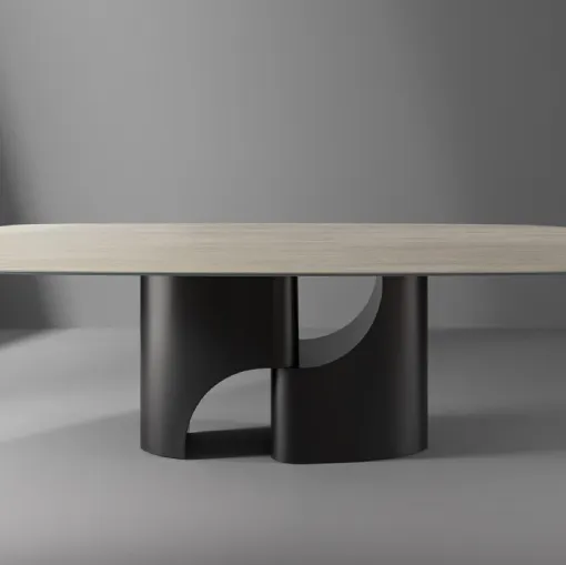 Tavolo Taijitu con piano in marmo e base in metallo di Bonaldo